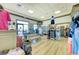 Golf apparel and equipment shop with a comfortable seating area at 8912 Heritage Sound Dr, Bradenton, FL 34212