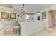 Modern kitchen with white cabinets and granite countertops at 8912 Heritage Sound Dr, Bradenton, FL 34212