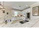 Modern kitchen featuring granite countertops and stainless steel appliances at 8912 Heritage Sound Dr, Bradenton, FL 34212