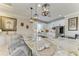 Island kitchen with granite countertops and pendant lighting at 8912 Heritage Sound Dr, Bradenton, FL 34212