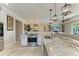 Modern kitchen with stainless steel appliances and granite island at 8912 Heritage Sound Dr, Bradenton, FL 34212