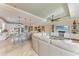 Open concept kitchen and living room with modern finishes at 8912 Heritage Sound Dr, Bradenton, FL 34212