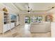 Living area with access to backyard patio and pool at 8912 Heritage Sound Dr, Bradenton, FL 34212