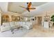 Spacious living room with comfortable seating and large TV at 8912 Heritage Sound Dr, Bradenton, FL 34212