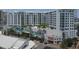 Modern building with rooftop pool and city views at 111 S Pineapple Ave # 1102, Sarasota, FL 34236
