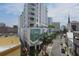 Modern building with vibrant artwork and street views at 111 S Pineapple Ave # 1102, Sarasota, FL 34236