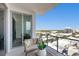 Expansive city views from private balcony with seating at 111 S Pineapple Ave # 1102, Sarasota, FL 34236