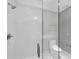 Bathroom with walk-in shower and toilet at 111 S Pineapple Ave # 1102, Sarasota, FL 34236