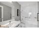 Modern bathroom with walk-in shower and sleek vanity at 111 S Pineapple Ave # 1102, Sarasota, FL 34236