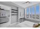 Bright bedroom with city views and access to living room at 111 S Pineapple Ave # 1102, Sarasota, FL 34236