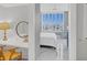 Bedroom with built-in desk and adjacent bedroom view at 111 S Pineapple Ave # 1102, Sarasota, FL 34236