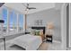 Comfortable bedroom with large windows and city views at 111 S Pineapple Ave # 1102, Sarasota, FL 34236