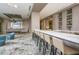 Community bar with seating and modern finishes at 111 S Pineapple Ave # 1102, Sarasota, FL 34236