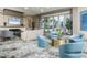 Relaxing community lounge with comfortable seating and fireplace at 111 S Pineapple Ave # 1102, Sarasota, FL 34236