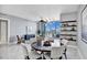 Elegant dining area with a round table and city views at 111 S Pineapple Ave # 1102, Sarasota, FL 34236