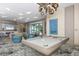 Upscale game room boasts a pool table and comfortable seating at 111 S Pineapple Ave # 1102, Sarasota, FL 34236