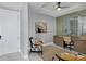 Bright home office with built-in desk and mirrored wall at 111 S Pineapple Ave # 1102, Sarasota, FL 34236