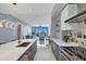 Modern open kitchen with island and city views at 111 S Pineapple Ave # 1102, Sarasota, FL 34236