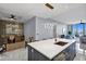 Modern kitchen with island and stainless steel appliances at 111 S Pineapple Ave # 1102, Sarasota, FL 34236