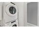 Stackable washer and dryer in dedicated laundry room at 111 S Pineapple Ave # 1102, Sarasota, FL 34236