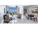 Spacious living room with city views and comfortable seating at 111 S Pineapple Ave # 1102, Sarasota, FL 34236