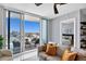 Living area with access to balcony and bedroom at 111 S Pineapple Ave # 1102, Sarasota, FL 34236