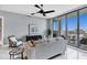 Living room with city views and comfy seating at 111 S Pineapple Ave # 1102, Sarasota, FL 34236