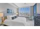 Bright bedroom with a king-size bed and city views at 111 S Pineapple Ave # 1102, Sarasota, FL 34236