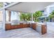 Modern outdoor kitchen with stainless steel appliances at 111 S Pineapple Ave # 1102, Sarasota, FL 34236