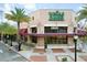 Whole Foods Market storefront with outdoor seating and palm trees at 111 S Pineapple Ave # 1102, Sarasota, FL 34236