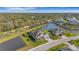 Aerial view of a house by the water, showcasing its setting at 15808 42Nd E Gln, Parrish, FL 34219