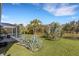 Spacious backyard with lush landscaping and pool area at 15808 42Nd E Gln, Parrish, FL 34219