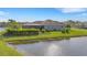 Single Gathering home with a screened enclosure and a lake view at 15808 42Nd E Gln, Parrish, FL 34219