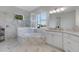 Bathroom with a large soaking tub and marble shower at 15808 42Nd E Gln, Parrish, FL 34219