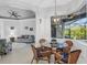Bright breakfast nook with view of living room and pool at 15808 42Nd E Gln, Parrish, FL 34219
