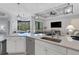 Open concept kitchen with large island and stainless steel appliances at 15808 42Nd E Gln, Parrish, FL 34219