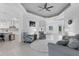 Open-concept living room with view of kitchen and dining area at 15808 42Nd E Gln, Parrish, FL 34219
