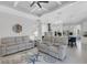 Open living room with views of the kitchen and island, and a relaxing seating area at 15808 42Nd E Gln, Parrish, FL 34219
