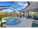 Inviting pool and patio area with outdoor kitchen and seating at 15808 42Nd E Gln, Parrish, FL 34219
