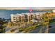 Aerial view of waterfront building, showcasing its location and design at 1600 W Marion Ave # 213, Punta Gorda, FL 33950