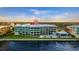 Aerial view of waterfront building with pool at 1600 W Marion Ave # 213, Punta Gorda, FL 33950