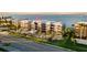 Aerial view of waterfront building, showcasing its location and design at 1600 W Marion Ave # 213, Punta Gorda, FL 33950