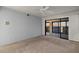 Bedroom with water views and balcony access at 1600 W Marion Ave # 213, Punta Gorda, FL 33950