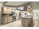 Kitchen with granite counters and skylight at 1600 W Marion Ave # 213, Punta Gorda, FL 33950