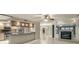 Kitchen with island and stainless steel appliances at 1600 W Marion Ave # 213, Punta Gorda, FL 33950
