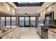 Kitchen with granite counters and water views at 1600 W Marion Ave # 213, Punta Gorda, FL 33950