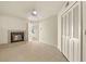 Living room featuring a fireplace and tile flooring at 1600 W Marion Ave # 213, Punta Gorda, FL 33950
