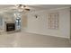 Bright living room with water view and fireplace at 1600 W Marion Ave # 213, Punta Gorda, FL 33950