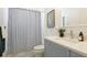 Bathroom with shower, toilet and vanity with sink at 16511 Cornwall Ln, Bradenton, FL 34202