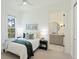 Main bedroom with ensuite bathroom and large window at 16511 Cornwall Ln, Bradenton, FL 34202